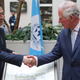 LYON, FRANCE - MAY 07: The Prince of Wales shakes hands with Interpol President Meng Hongwei during his tour of Interpol as part of his visit to France on May 8th, 2018 in Lyon, France.